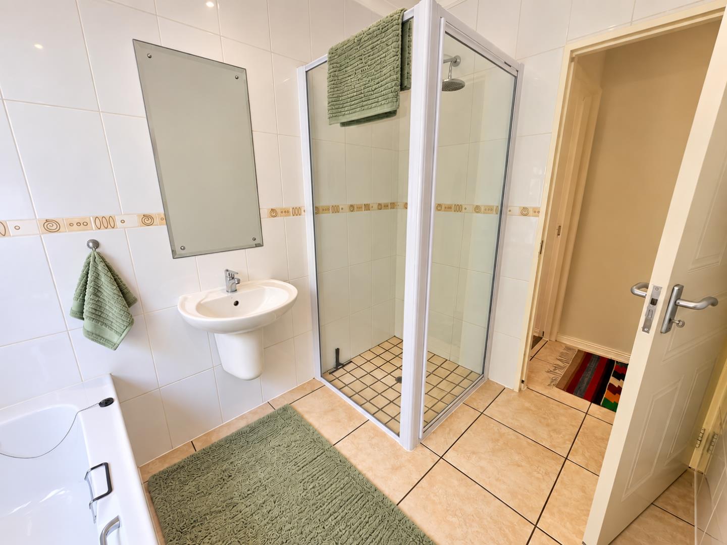 769386_Bright_Minimalist_Bathroom_with_Sage_Accents.png