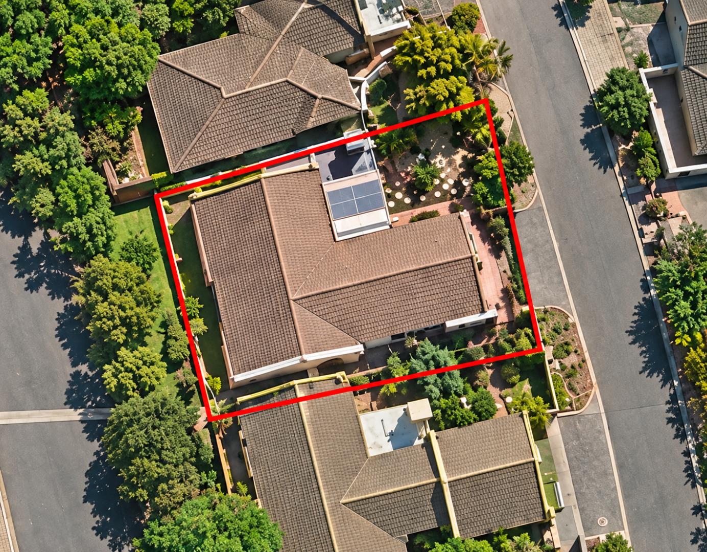 769441_Red-Bordered_Suburban_Home_Aerial.png