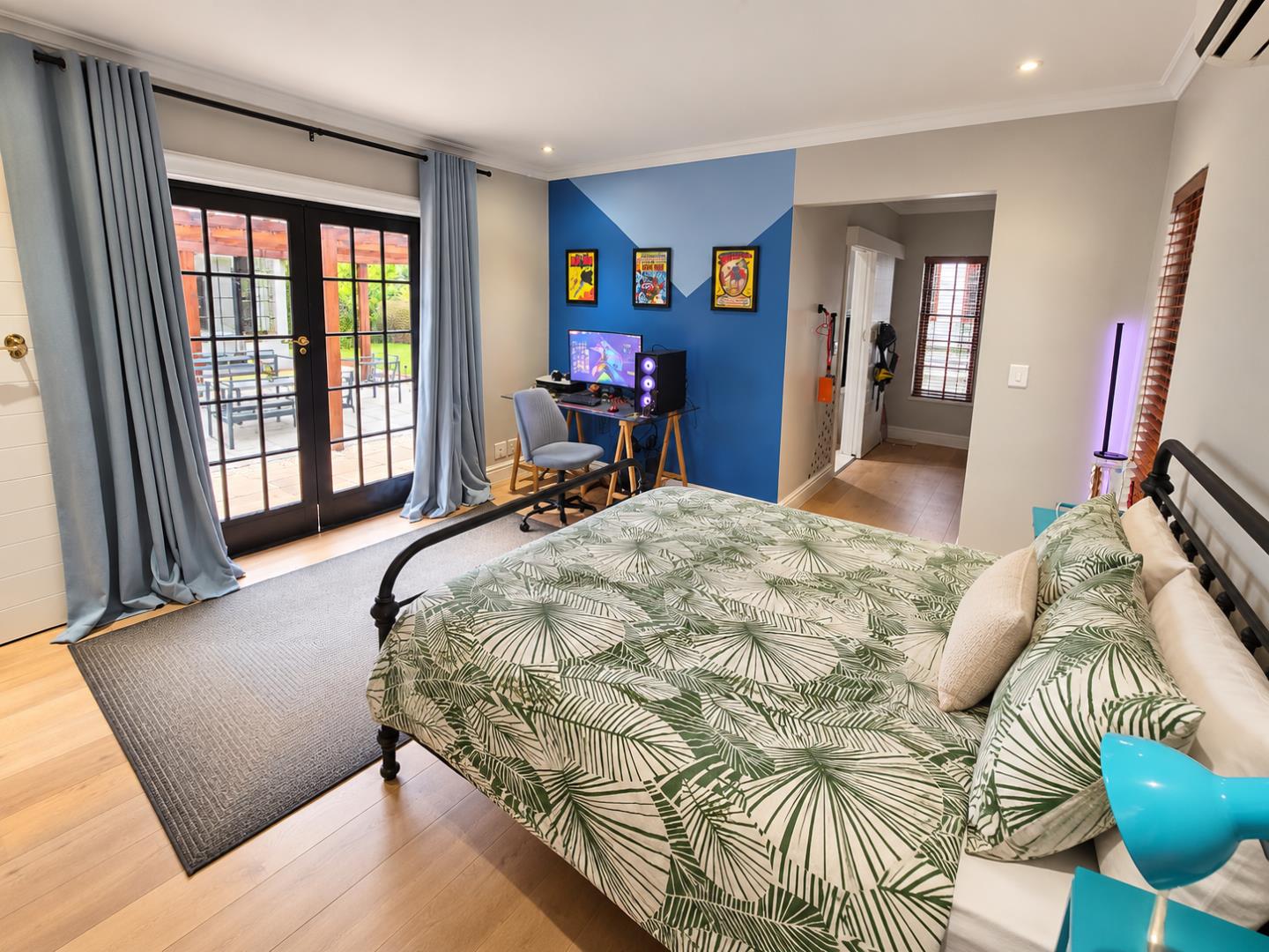 769572_Bright_Modern_Bedroom_with_Gaming_Desk.png