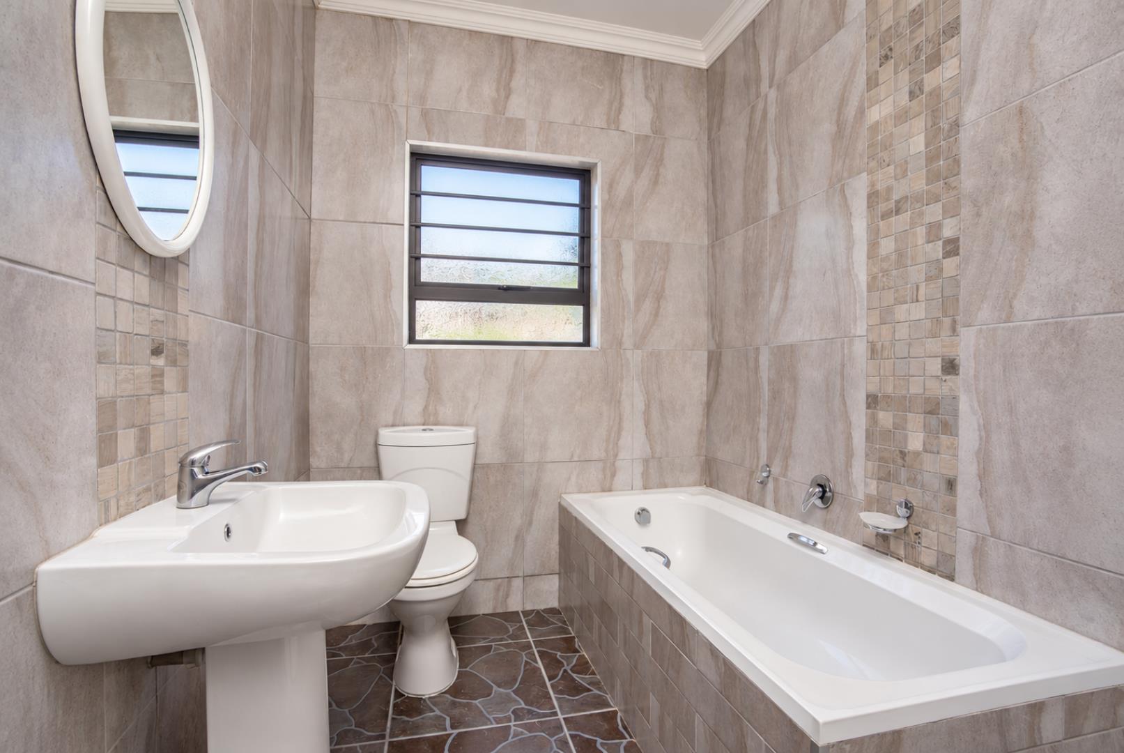 769601_Clean_Modern_Tiled_Bathroom.png