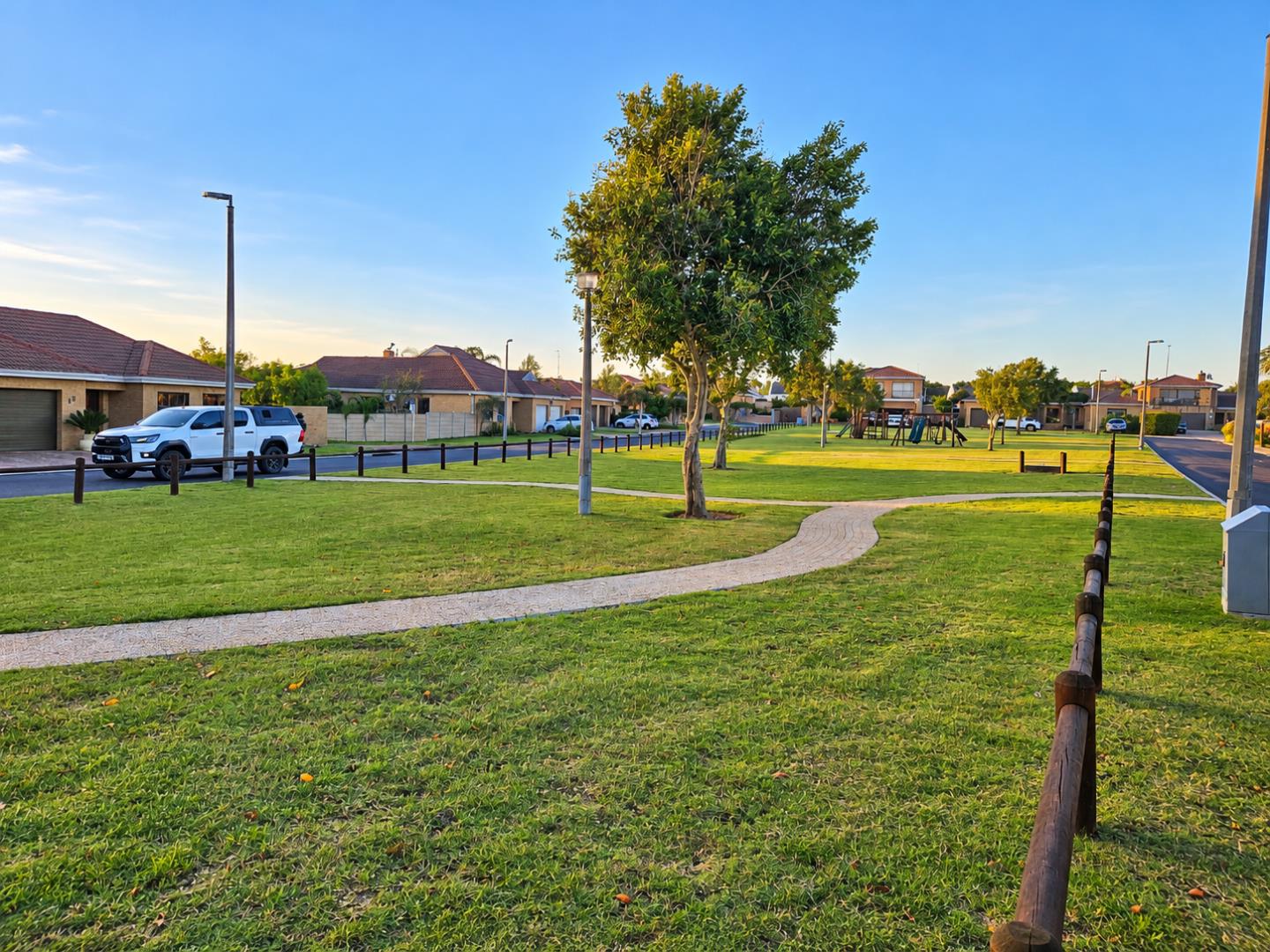 769601_Golden-Hour_Suburban_Park_Walk.png