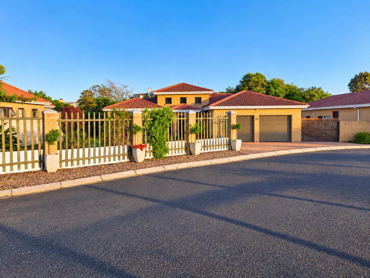 769601_Sunlit_Suburban_Home_with_Landscaped_Front_Yard.png