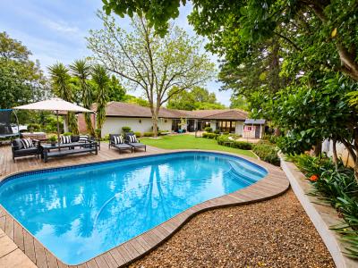 769572_Luxury_Poolside_Patio_with_Striped_Cushions.png